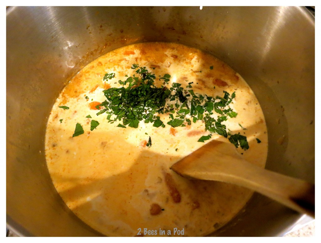 Adding fresh mint to Creamy Thai Carrot Soup - unbelievable flavor in this Weight Watchers recipe