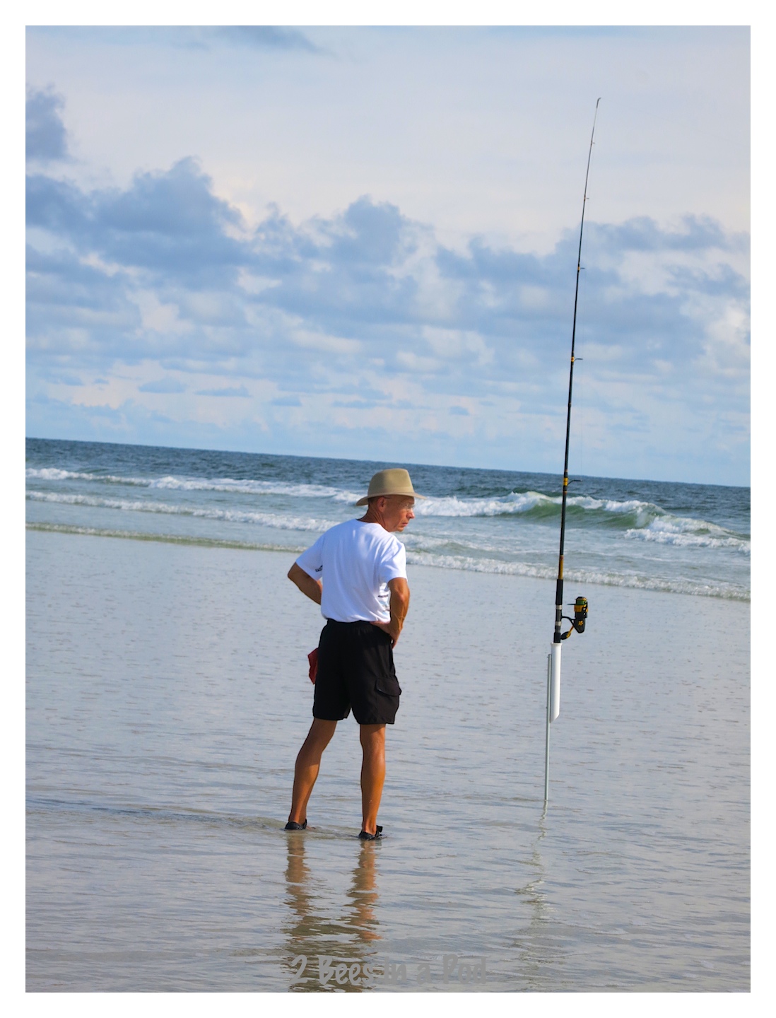This fisherman crafted his own fishing rod holder with PVC pipe at Crescent Beach, Florida