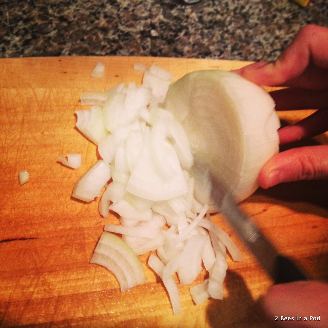 1-Chopping onions for homemade chili.