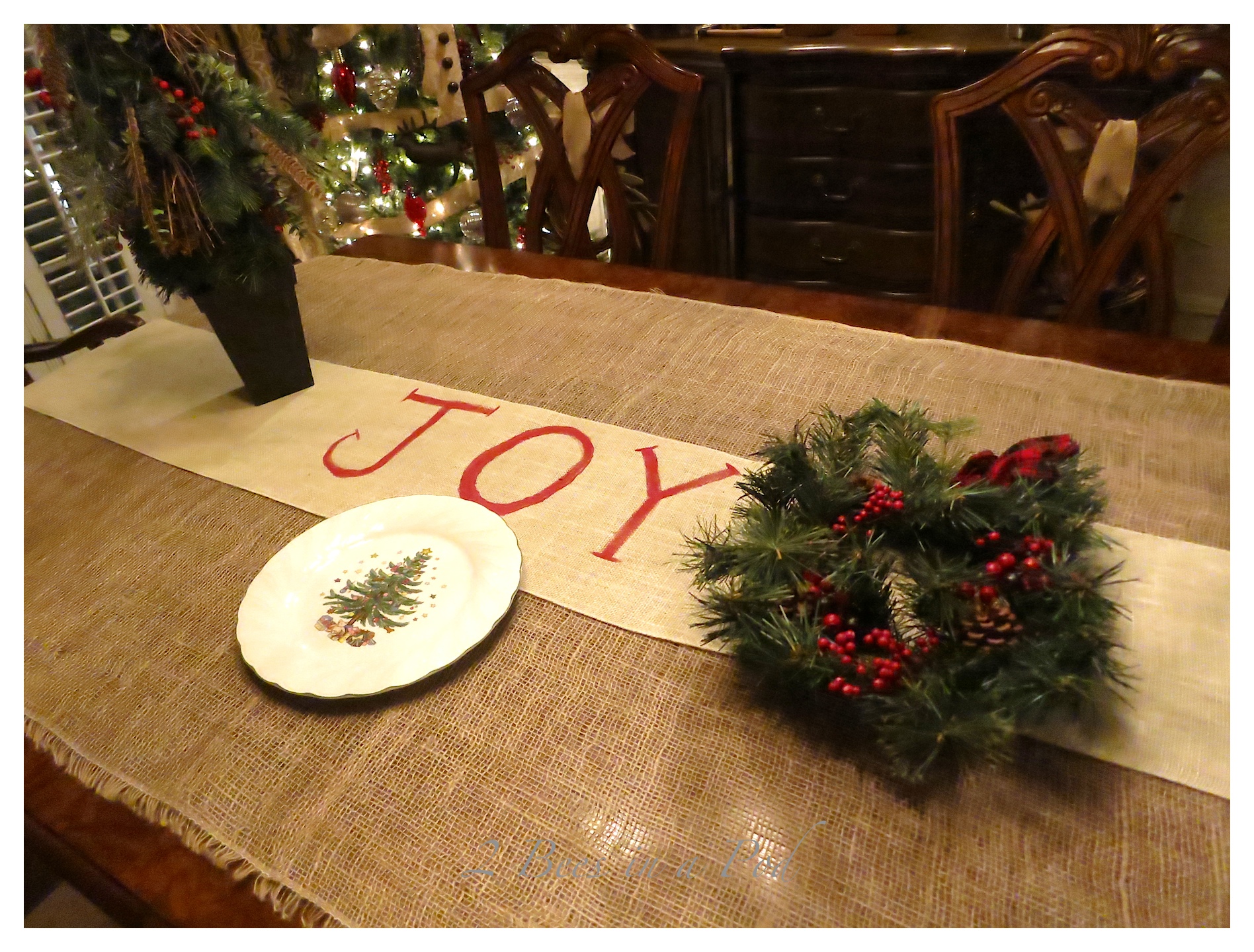 DIY hand painted Christmas table runner for the dining room. I chose to paint JOY as my message :) I love the rustic burlap.