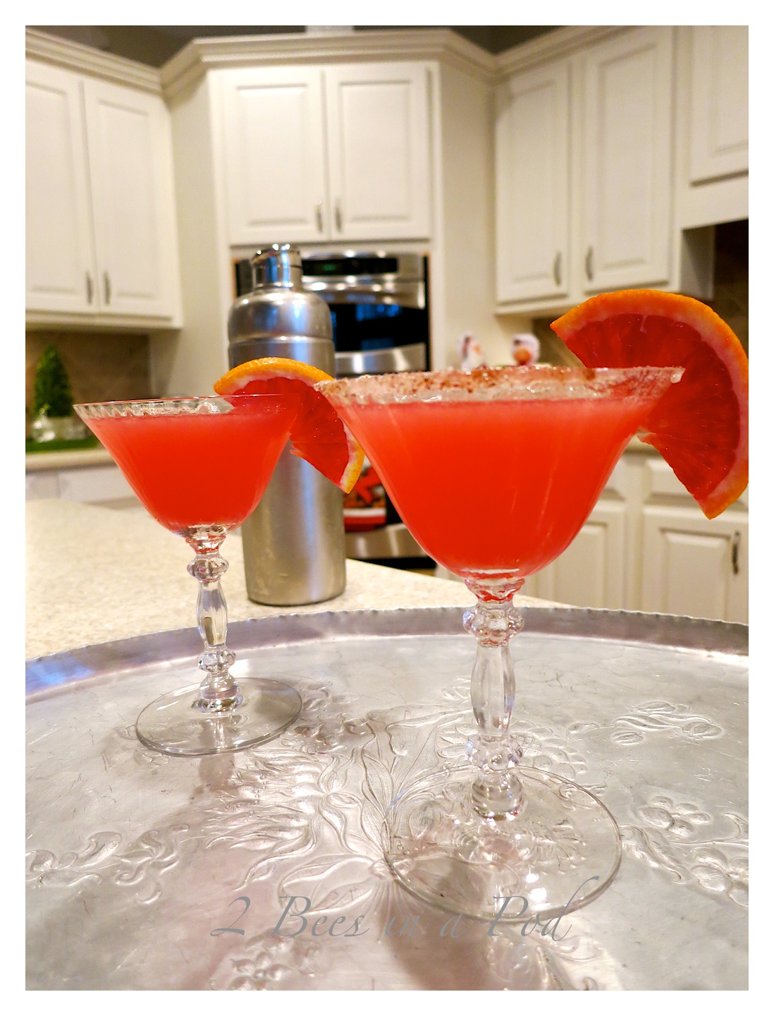 Yummy Blood Orange Martini - the perfect Christmas cocktail. Fresh squeezed Blood Orange juice, vodka, orange liquor and simple syrup.