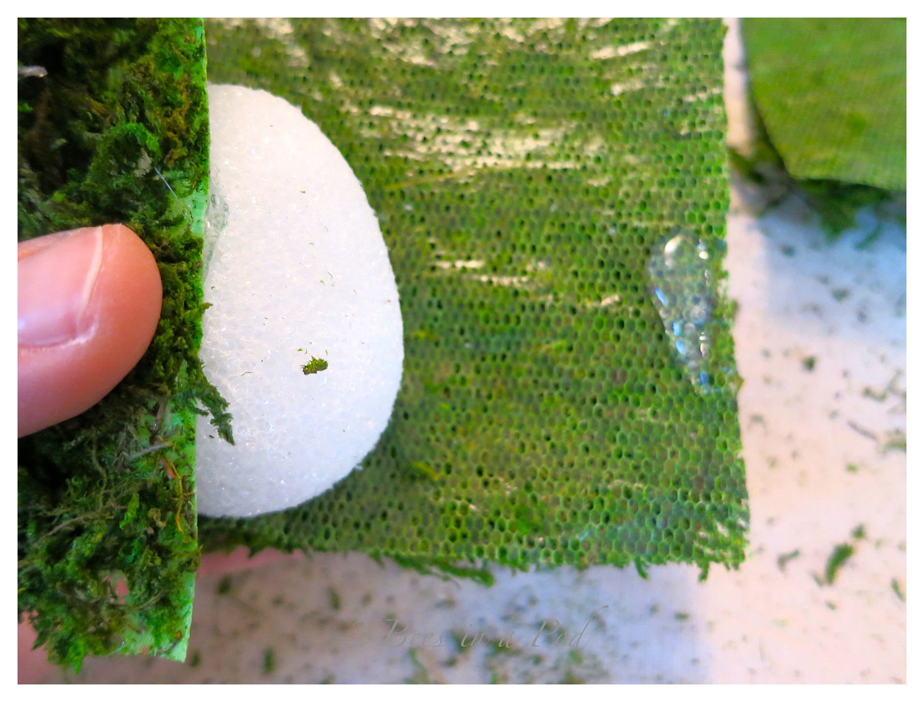 DIY moss covered eggs for Spring and Easter. Easy do-it-yourself project that takes just minutes - sheet moss, styrofoam eggs and a glue guns!