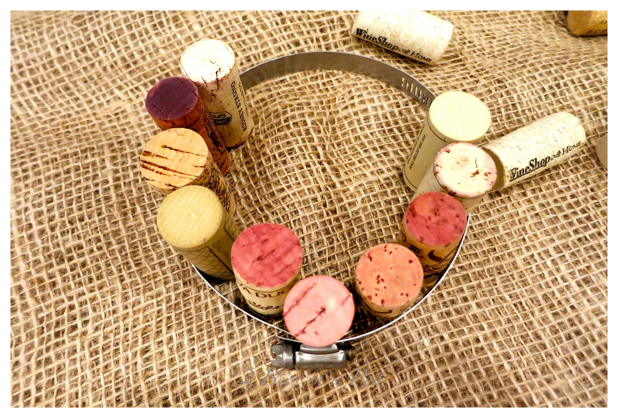 Easy DIY Wine Cork Hot Pad - just use a clamp and leftover wine cork and hot glue.