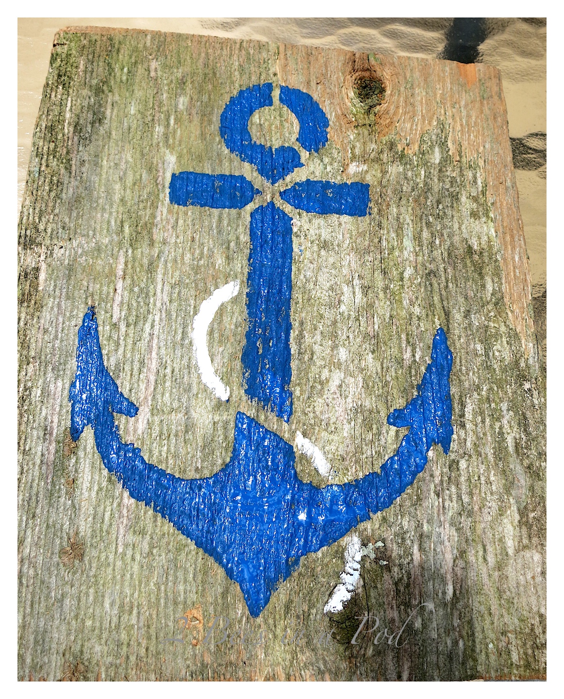 We repurposed old fencing from a friends yard. One of the projects that we did was create patriotic Americana nautical art. We stenciled red, white and blue anchors and then distressed and antiqued the wood.