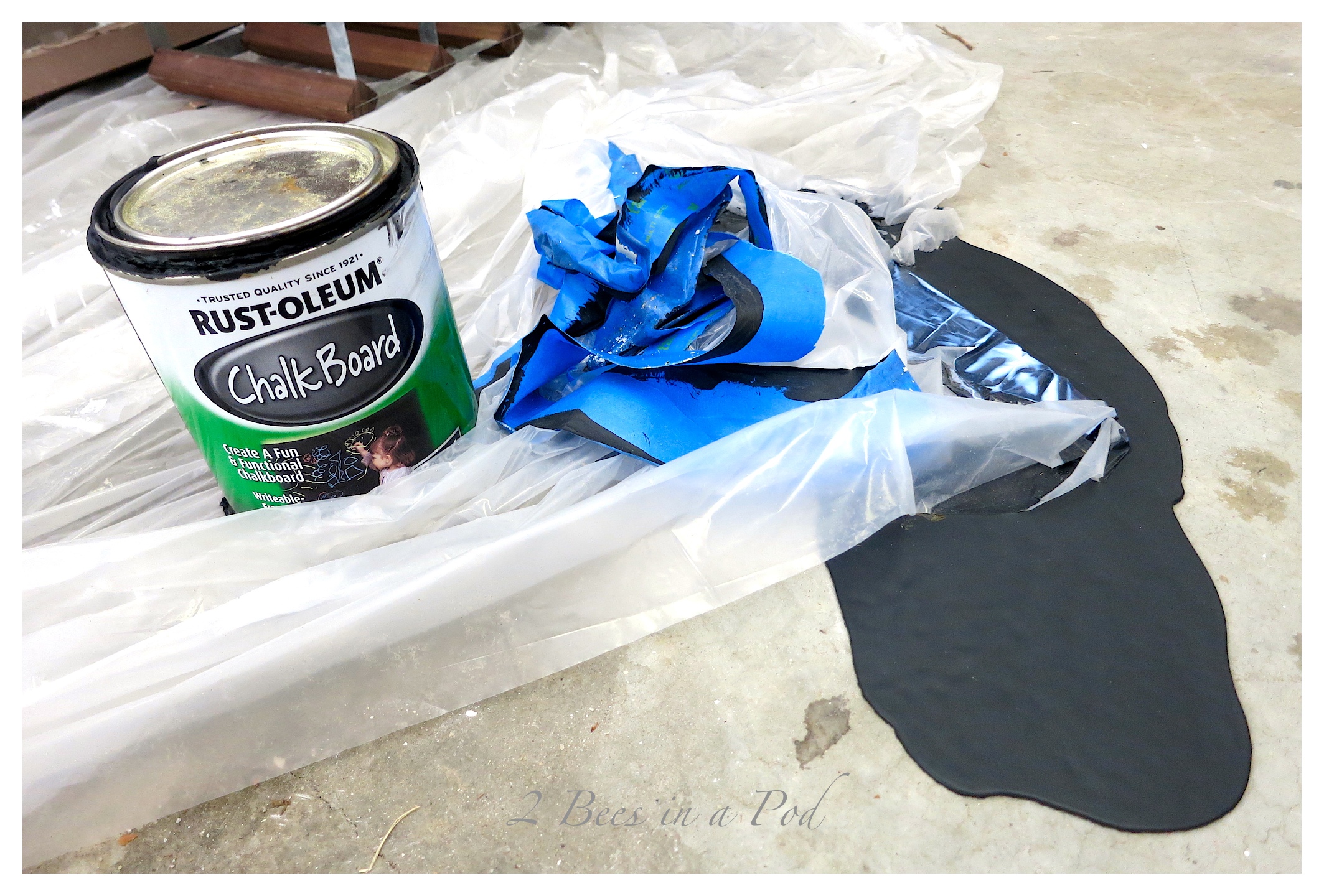 How to clean up spilled chalkboard paint off of concrete.