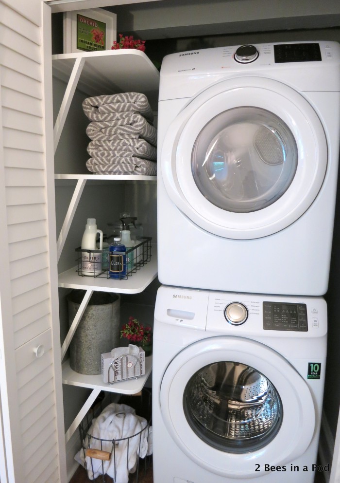 Staying organized was partly the motivation behind the laundry closet makeover. With the custom shelves, stackable unit, and other elements, this small space makes a big impact.