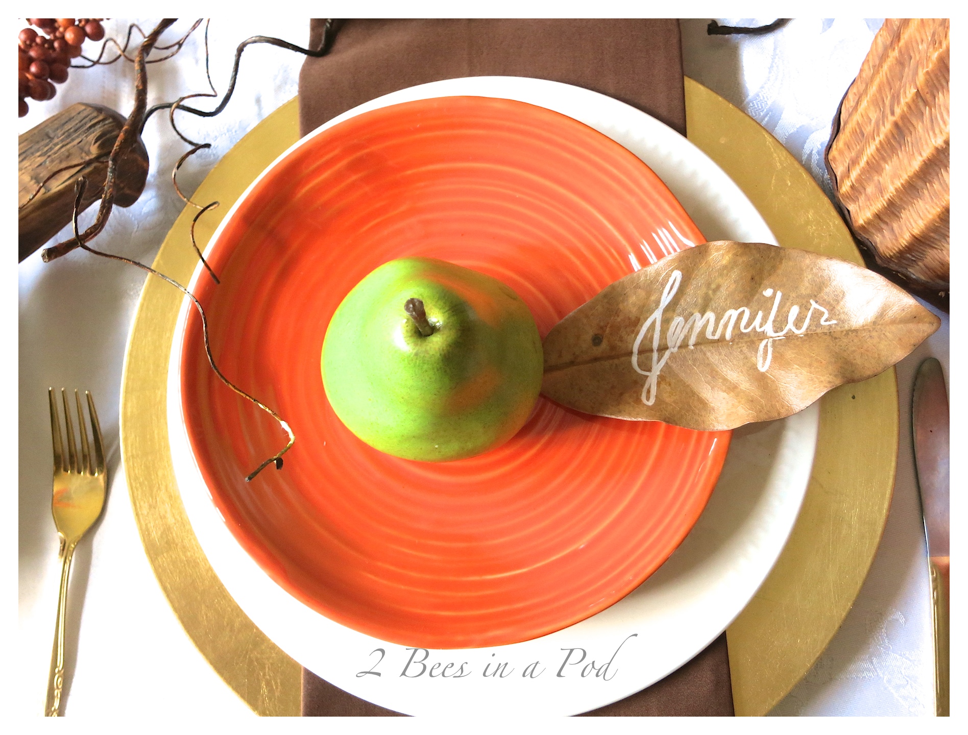 Fall tablescape using bright green pears, burnt orange, vintage and rustic elements. Also the ise of natural elements - leaves, berries, cotton and twigs. This is a Bloggers Fall Tour.