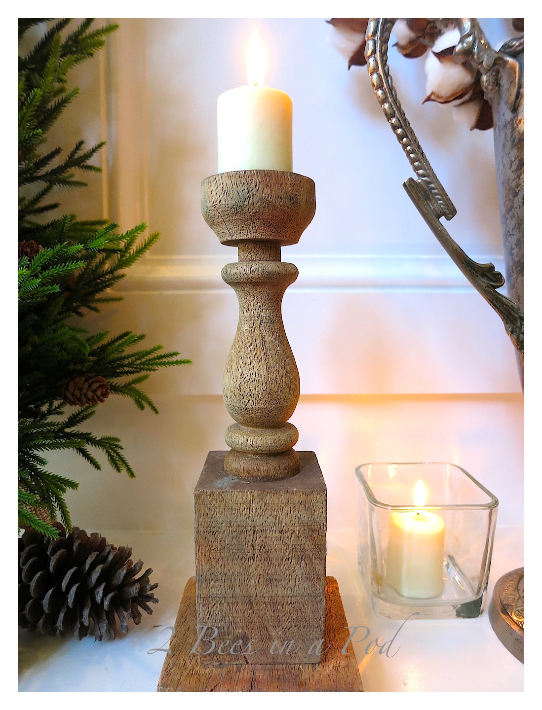 Winter Mantel Decor - natural elements of twigs,wood,  pinecones, cotton and feathers enhanced by candlelight and deer bust