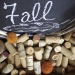 Fall Coffee Table decor. Vintage trohpies. Wine corks. feathers and natural elements on a wood tray