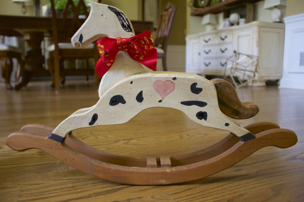 Thrift store rocking horse gets a makeover with chalk paint.