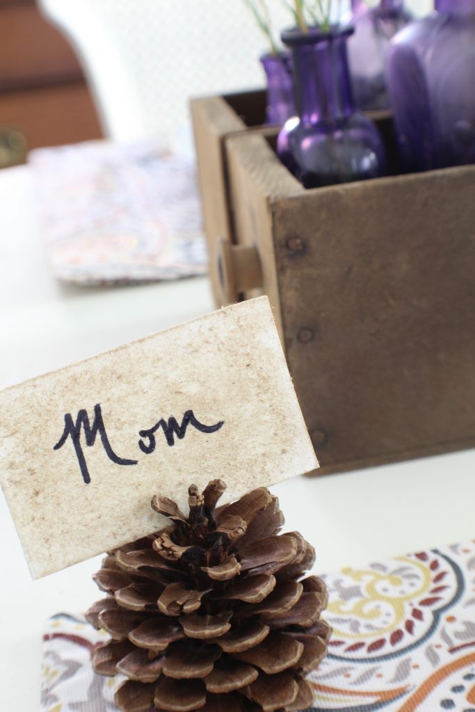 Fall home tour. Place card with pine cone.