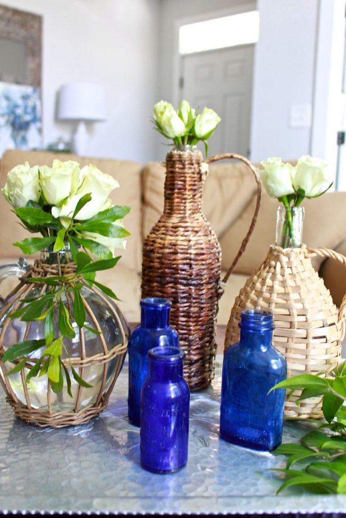 Wicker Demijohn Bottles. Thrift style is gorgeous.