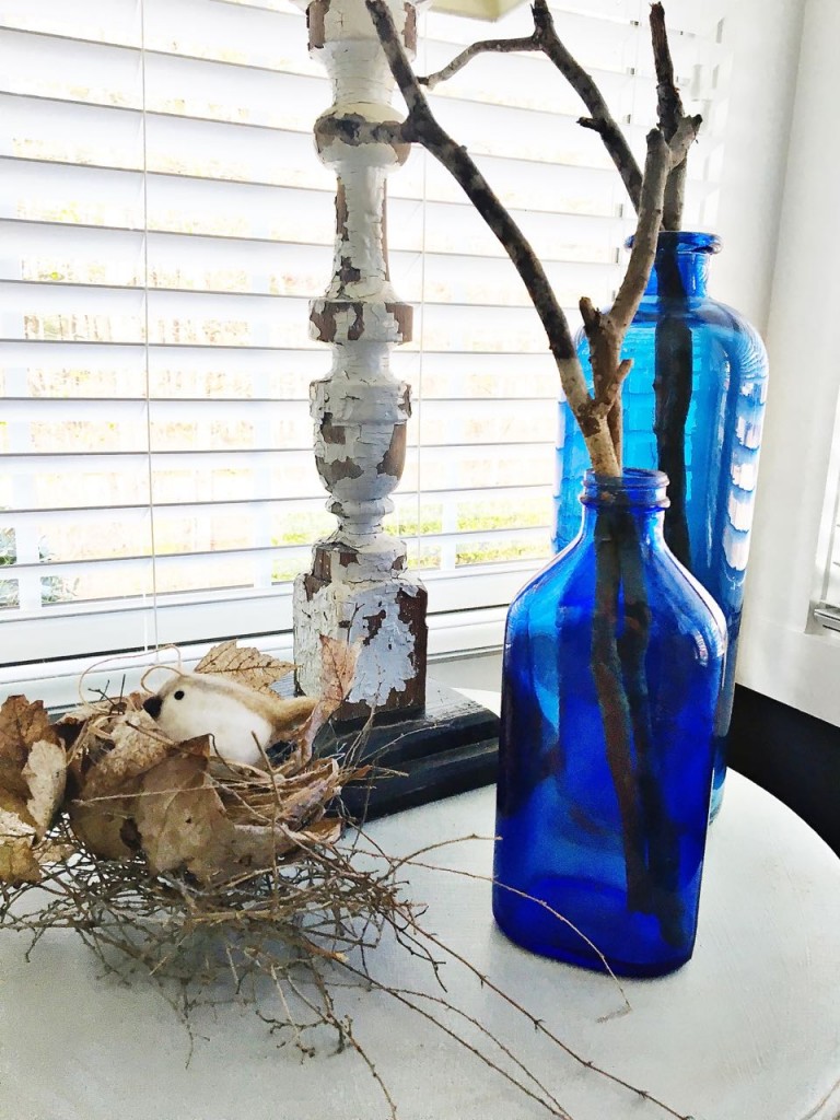 free fall decor ideas can be glass bottles. no need to spend money on fall decor