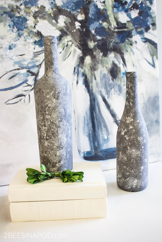 Faux Galvanized Painted Wine Bottles can be used as candleholders