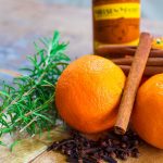 Rosemary and Citrus Orange Spice Simmer Pot - Banish Winter Funk. Fresh orange peels added to a pot of water with spices make a simmer pot.