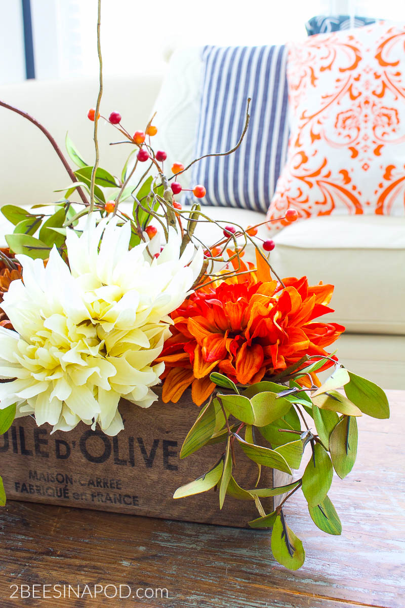 Easy Fall Centerpiece - silk flowers from the dollar store look so good