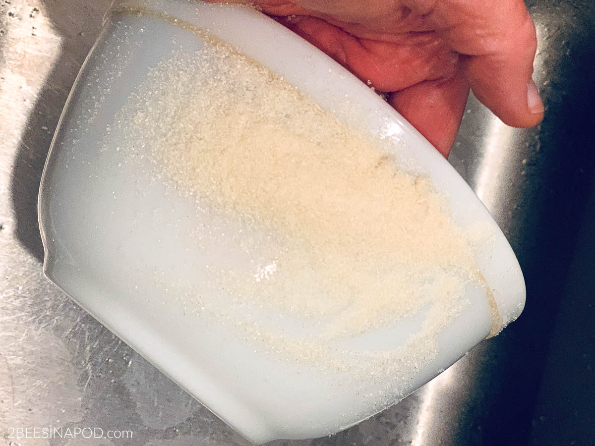How to Remove Faded Design From a Vintage Pyrex Bowl - scrub with raw sugar or other abrasive